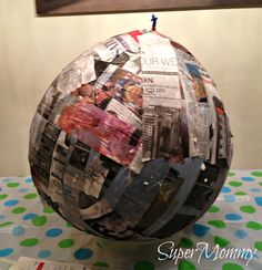 a paper mache sphere sitting on top of a table