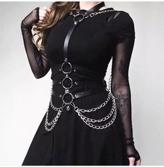 Make a bold statement with this black punk loose chain pu leather harness. With its edgy design, this body harness is perfect for adding a punk flair to your wardrobe. The faux leather and metal details give this harness a steampunk look that will stand out from the crowd. Wear it with a dress or over a long-sleeve shirt for a unique statement look. Shop now and add this stylish piece to your wardrobe! Harness Outfit, Punk Street Style, Punk Woman, Chain Harness, Goth Outfit, Body Harness, Punk Outfits, Leather Harness, Gothic Outfits