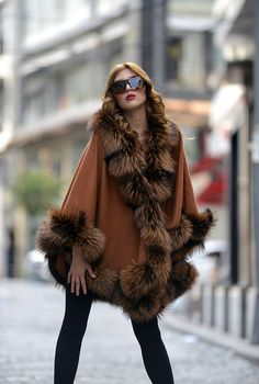 One Size Winter Cape, Fall Cape Fur Coat With Faux Fur Trim, Brown Winter Cape For Cold Weather, One Size Cape For Cold Weather, Cozy Brown Outerwear One Size, Fall Shawl Cape For Cold Weather, Winter Cape Outerwear With Faux Fur Trim, Cape Outerwear With Faux Fur Trim For Cold Weather, Cozy Winter Cape