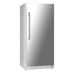 a white refrigerator freezer sitting on top of a white floor next to a wall