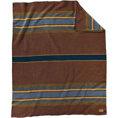 a brown and blue striped blanket on a white background