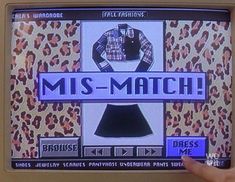 a hand is holding an old computer screen with the words mis - match on it