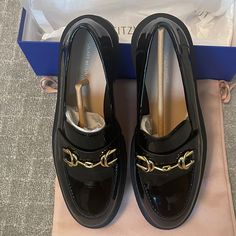 Never Worn Black Patent Leather Loafers With Gold Buckle, Platform Heel. Elegant Patent Leather Platform Loafers With Almond Toe, Elegant Patent Leather Almond Toe Platform Loafers, Elegant Flat Platform Loafers For Work, Elegant Platform Loafers With Rubber Sole, Elegant Flat Platform Loafers For Office, Elegant Flat Platform Loafers For Business Casual, Elegant Flat Platform Loafers With Rubber Sole, Elegant Platform Loafers With Round Toe In Patent Leather, Elegant Patent Leather Platform Loafers With Round Toe