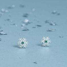 Limited winter collection: small snowflakes earrings with zircon of different colors, simple and elegant. Please select color of gemstone during order, thank you! Great start for coming winter season! Perfect Christmas gift for you wife or girlfriend. Looks perfect in set with our snow necklace: https://www.etsy.com/listing/575949247/ - Snowflake necklace Details: - width 10 mm - material: silver 925 Please read my shipping and policies tab for shipping info.  All items are packaged in moisture resistant packaging to ensure they arrive in perfect condition. Don't hesitate to contact me with any questions or requests you may have. Elegant Winter Gift Earrings, Cubic Zirconia Snowflake Earrings For Gift, Snowflake Earrings For Winter Gift, Winter Snowflake Earrings For Gifts, Snow Necklace, Small Snowflakes, Snow Earrings, Xmas Jewelry, Snowflake Necklace