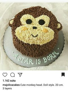 a birthday cake with a monkey face on it