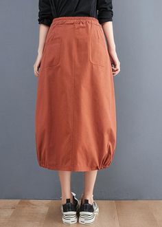 Organic Orange Tie Waist Pockets Casual Fall SkirtsFabric: Cotton 45%, Linen 55%Size & Fit: This garment fits true to size.Length: Size 2XL measures 30.03"from waist to hem.Waist:Fitted - very fitted at natural waist Hip: Loosely Fitted. room for hips. Hand Wash Cold. Casual Non-stretch Skirt With Pockets, Non-stretch Brown Skirt With Pockets, Spring Baggy Skirt With Pockets, Non-stretch Skirt With Pockets, Baggy Cotton Knee-length Skirt, Baggy Knee-length Cotton Skirt, Non-stretch Knee-length Skirt With Pockets, Cotton Skirted Bottoms With Pockets, Orange Cotton Skirt For Fall