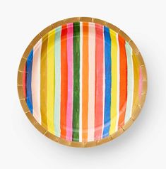 a colorful striped paper plate on a white background