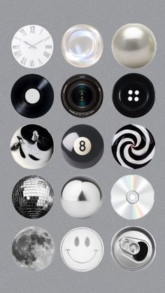 an assortment of various buttons and knobs on a gray background