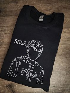 BTS Suga line art embroiderd on 50% cotton, 50% polyester blend crewneck sweatshirt , or hoodie. Perfect for any BTS, Suga, Yoongi, AgustD fan. Kpop Style Cotton Sweatshirt For Streetwear, Black Kpop Style Crew Neck Sweatshirt, Bt21 Hoodie, Agust D Shirt, Agust D Tshirt, Kpop Fan Merchandise T-shirt With Crew Neck, Bts Hoodie, Bts Merch Sweatshirts & Hoodies, Lyric Shirts