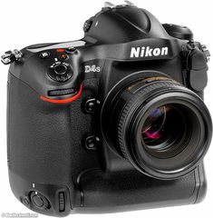 the nikon d4s camera is shown with its lens attached to it's body