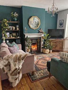 a living room filled with furniture and a fire place next to a fireplace covered in potted plants