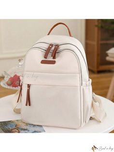 Bird in Bag - Premium Quality Solid Color Casual Backpack for Women with Zipper Closure - Ideal for Everyday Use Cream Backpack With Zipper For Back To School, Cream Backpack With Zipper Closure For Back To School, Casual Cream Backpack With Zipper Closure, Trendy Cream Backpack For Travel, Cream Backpack With Zipper Closure, Beige Bags With Zipper Closure For Back To School, Beige Backpack With Zipper Closure For School, Everyday Cream Backpack With Zipper Closure, Cream Everyday Bag For Back To School