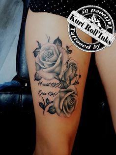 a woman's thigh with roses on it and the words, i love you