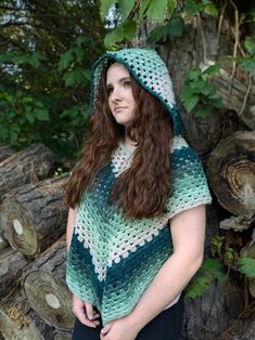 In a world of fast fashion, investing into a handcrafted piece can be rewarding and a better sustainable option.  This is a handmade poncho with green Gradient acrylic cotton mix yarn.  This poncho is adult sized with arm holes, hood, and generally fitting sizes S - L. If you desire a larger or smaller size then message me. Green Bohemian Poncho For Spring, Bohemian Green Poncho For Spring, Winter Green Hooded Poncho, Green Poncho, Green Beach Poncho, Green Oversized Poncho, Cozy One-size Green Poncho, Ladies Poncho, Fast Fashion