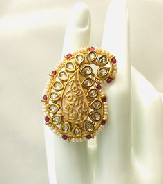 "Mint Green Ring/Pink Kundan Ring/Bridal Sabyasachi Kundan Ring/Kundan Ring/Bridal Ring/Meenakari Kundan ring/Cocktail Ring@AryaFashions Features: 1-Made in Brass 2-Adjustable Ring 3-Available in Gold finish 4- Made with very high quality Kundan Stones 5- Lightweight Jewelry 6- Suitable for any traditional or contemporary occasion 7- Width: 1.5\" Facebook: www.facebook.com/shoparyafashions Pinterest: www.pinterest.com/aryafashions Instagram: www.instagram.com/shoparyafashions Twitter: www.twitte Kundan Ring, Kundan Jewellery Bridal, Green Ring, Polki Necklace, Light Weight Jewelry, Green Rings, Kundan Jewellery, Pink Ring, Green Item