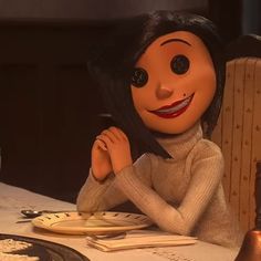 an animated doll sitting at a table in front of a clock with her hands on her face