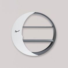 a clock with a crescent shaped face on it