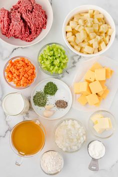 all the ingredients needed to make an appetizer laid out on a marble counter top