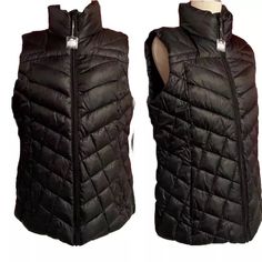 Big Chill Sleeveless Puffer Vest Full Zip Closure, With A Stand Up Collar, And Zip Closure Side Pockets. 100% Polyester Shell And Lining. Filling Is 85% Polyester, 8% Down And 7% Feather Size Medium New, With Tags Shown On A Size 4 Dress Form About 20" Across Bust, Measured At Under Arms [40" Total] 22" Across Bottom 25" Long, From Shoulder Down Excellent New Condition. Original Tags Attached. Black Sleeveless Nylon Vest, Cold Weather Sleeveless Nylon Vest, Sleeveless Nylon Vest For Cold Weather, Black Cold Weather Vest Outerwear, Black Vest Outerwear For Cold Weather, Fitted Black Vest For Cold Weather, Black Fitted Vest For Cold Weather, Green Patagonia Jacket, Sleeveless Puffer