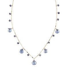 A stunning piece of everyday elegance, the Briolette Drop Necklace is another bestseller. The decadent drops of stationary gemstones look great with a casual outfit but can easily transition to a formal occasion. Handcrafted in 14k gold-fill or sterling silver Available in 18" or 32" length with a lobster claw clasp Shown in green amethyst, garnet, blue topaz, white topaz. Also available with precious stones. View our Gem Glossary Elegant Faceted Necklace For Everyday Wear, Elegant Drop Necklace With Gemstone Beads, Elegant Drop Necklace With Natural Stones And Teardrop Pendant, Elegant Briolette Gemstone Drop Necklace, Elegant 14k Gold-filled Jewelry With Gemstone Accents, Elegant 14k Gold Necklaces With Natural Stones, 14k Gold Briolette Necklace With Gemstone Accents, Elegant Briolette Drop Necklace With Faceted Detail, Elegant Briolette Faceted Drop Necklace