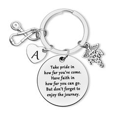 a keychain with a poem on it that says take pride in how far you've come