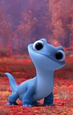 a small blue dinosaur with big eyes sitting on the ground