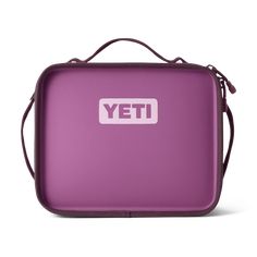 a purple lunch box with the word yet on it