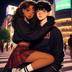 two people are hugging in the middle of a city street at night, one is wearing a black hoodie and the other wears a plaid skirt