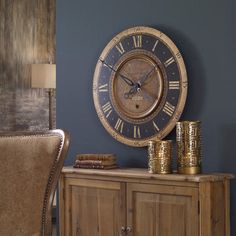 a wooden cabinet with a clock on the wall