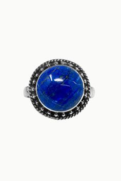 Aurora is a beautiful ring featuring a smooth round cushion cut Lapis Lazuli nestled in a finely detailed, sterling silver frame. Aurora is the perfect pick-me-up when you need that extra sparkle with it's ethereal, vintage-inspired design in silver. Authentic Sivalya Lapis Lazuli Lapis Lazuli: Inner Power - Wisdom - Manifestation Hallmarked Metal: 925 Sterling Silver Gemstone Size: 10mm x 10mm Cut: Round Shaped Smooth Cabochon Adjustable Gemstone Signet Ring, Sterling Silver Signet Ring With Center Stone, Classic Engraved Gemstone Ring, Classic Engraved Ring With Gemstone, Sterling Silver Signet Ring With Bezel Setting, Silver Domed Rings With Gemstones, Classic Silver Sapphire Cabochon Ring, Classic Silver Sapphire Ring With Cabochon, Adjustable Timeless Dome Ring