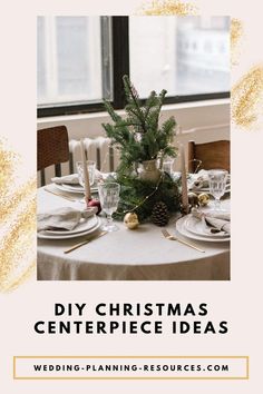 a christmas centerpiece is displayed on a table with candles, plates and silverware