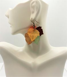 Autumn Leaf Dangle Earring Lucite Leaves Antique Brass. The fishhook ear wires are 21 gauge Antique Brass. Drop length from top of wire is 2 inches. Leaves are Lucite and both earrings are very light weight and weigh .2 oz. Earrings come in a box and an organza bag ready to gift. Lucite Flower Earrings, Autumn Leaf, Antique Earrings, Leaf Earrings, Fish Hook, Organza Bags, Flower Earrings, In A Box, Ear Wires