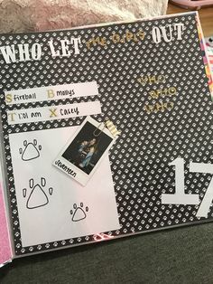 a scrapbook with pictures and writing on it that says who let me out?