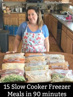 a woman standing in front of a table filled with bags of food on top of it