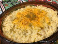 a bowl filled with mashed potatoes on top of a table