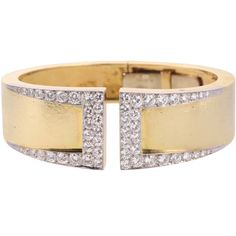 18k yellow gold and platinum Gap cuff bracelet by David Webb. Retail $42000. Set with approx. 3.40ctw SI1/H diamonds. DESIGNER: David Webb MATERIAL: 18k Gold / Platinum GEMSTONES: Diamond DIMENSIONS: Bracelet will fit an approx. 6.5" wrist, width 23mm. MARKED/TESTED: Webb, Plat, 18k. WEIGHT: 65.6 grams CONDITION: Previously Owned/Excellent Condition Formal Yellow Gold Diamond Cuff Bracelet, Modern Yellow Gold Cuff Bracelet With Single Cut Diamonds, Designer Diamond Cuff Bracelet In Gold, Designer Gold Diamond Cuff Bracelet, Designer Gold Cuff Bracelet With Diamonds, David Webb, Gold Bracelet Cuff, Diamond Gold, Gold Platinum