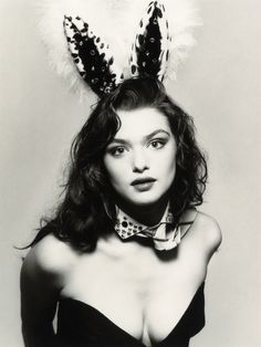 black and white photograph of a woman wearing bunny ears