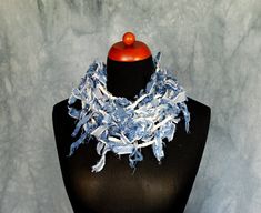 Textile necklace denim jewelry, Upcycled denim necklace, Infinity scarf necklace, Eco-friendly gifts for friend Handmade necklace made of cotton string and tattered stripes of upcycled denim. The necklace is hand crocheted and that's why it's unique - the same chain cannot be made a second time. Such a necklace can be a perfect addition to summer styling.  It could also be a perfect gift for eco-friendly friends. The necklace is handmade and may slightly differ from what is shown in the picture. Caution: because the necklace includes tattered elements, from time to time loses small pieces of thread.  Because of different monitors and screen resolutions, color may look different on the screen than in reality. Machine washes in lukewarm water. More necklaces you can find here: https://etsy.m Denim Necklace, Wolf Hat, Necklace Infinity, Gifts For Friend, Textile Necklace, Summer Styling, Denim Jewelry, Scarf Necklace, Cotton String