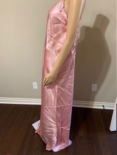 This is a luscious satin slip dress from the 1930s in a most flattering deep pink hue. In addition to its unique color, this gown is very large. I have pinned it a bit so that it didn't slide off my size 2 mannequin. It would definitely look great on a very voluptuous figure or the seams could be taken in to fit a rather large range of smaller sizes. In any case, it is in outstanding condition, with no holes, tears, or major stains. Fantastic! Approximate measurements: Bust: 49 inches Waist: 42 Spring Pink Bias Cut Slip Dress, Pink Bias Cut Maxi Length Slip Dress, Pink Bias Cut Slip Dress, Pink Floor-length Bias Cut Dresses, Pink Satin Slip Dress With Lace Trim, Satin Slip, Satin Slip Dress, Pink Satin, Unique Colors