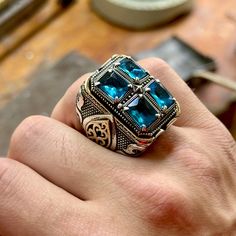 Men Silver Large Ring, Square Aquamarine Stone Ring , Large Man Blue Topaz Ring, Ottoman Style Ring, Father Day, Gift For Him, 925k Silver ★Item Details * Gender : Male / Female * Material : 925K Sterling Silver * Gemstone : Aquamarine  Stone * Stone Size  : 20x30mm ✔ Ready to Ship in 1-2 Business Days .. ✔ Shipped to the Worldwide 1-5 business days with free shipping... ✔ The product will be sent to you with a handmade wooden box to avoid any damage during shipping... ✔ Visit our store, browse other Men's jewelry, silver and gold collections, and find the perfect piece you're looking for... -All Countries 3 - 7 Days -All Products Are Sent With Tracking Number. ( TNT , UPS , PTT ) Click For Our Other Products  https://www.etsy.com/shop/MercansilverTR?ref=simple-shop-header-name&listing_id= Aquamarine Stone Ring, Topas Ring, Ring Square, Handmade Wooden Boxes, Ottoman Styling, Large Man, Aquamarine Stone, Large Ring, Gold Collection