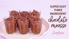 there are chocolate mousse cups on a plate with the words super easy three ingredient chocolate mousse