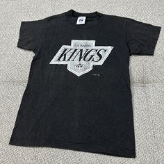 Vintage Youth Los Angeles Kings Chevy Logo 7 Athletic Med 10/12 Black T Shirt. Chevy Logo, Los Angeles Kings, Shop Fans, Black T Shirt, Black Tshirt, Chevy, Angeles, ? Logo, T Shirt