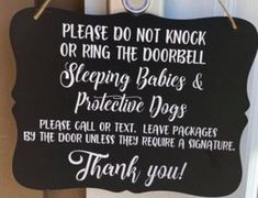 a sign that says please do not knock or ring the door bell sleeping babies and protective dogs