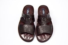 Luxury Brown Slides With Leather Sole, Elegant Brown Slides With Leather Sole, Luxury Brown Slippers With Leather Sole, Luxury Formal Slides With Leather Lining, Elegant Brown Leather Slippers, Elegant Brown Slippers With Round Toe, Luxury Leather Summer Slippers, Elegant Slip-on Slides With Leather Lining, Elegant Leather-lined Slip-on Slides