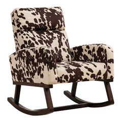 a brown and white cow print rocking chair