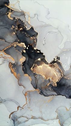 an abstract painting with black, gold and white colors on the water's surface