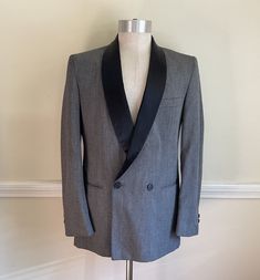 "Vintage Tuxedo Jacket Gray w Black Flecks / Semi Sheen Gray Speckled Black Dinner Tux Jacket / Chest  \" Length   \"  Vintage Tuxedo Jacket in a gunmetal silver gray...Features a textured fabric in shades of gray with black flecks and a very slight sheen that's not quite Sharkskin...The classic style features padded shoulders, a black Satin shawl collar, a 2 button double-breasted front that closes with one black button & one more front adjacent button (2 total front buttons- there's an inside Black Tuxedo Style Outerwear With Shawl Collar, Fitted Black Tweed Jacket With Suit Collar, Fitted Business Outerwear With Shawl Collar, Black Tuxedo With Shawl Collar For Winter, Black Shawl Collar Tuxedo For Winter, Fitted Black Double-breasted Sport Coat, Fitted Gray Outerwear With Single Button, Fitted Black Tweed Jacket For Tailoring, Gray Fitted Double-breasted Suits