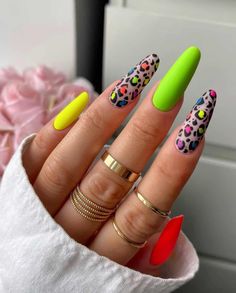 Love the 90’s nails aesthetic? You need to see this list of 90s nails to try at your next manicure. Learn about 90s nail trends and be inspired with this mix of retro nails including acrylic, almond, coffin, square, short, long, simple, and intricate 90s nail design ideas. There’s so much nostalgia here! 90s Nails, Cheetah Print Nails, Popular Nail Colors, Retro Nails, Cheetah Nails, Vintage Nails, Pretty Nail Designs, Leopard Nails