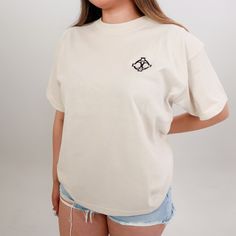 The Charming Misfit Crew Tee is all about comfort and style. Available in black and beige, this heavy-weight, 100% cotton tee has a slightly oversized fit that’s perfect for a relaxed, everyday look. Materials: 18/1 100% Cotton (Heavy Weight) Made in the USA Black And Beige, Made In The Usa, Heavy Weight, Everyday Look, Black Tee, Cotton Tee, Black