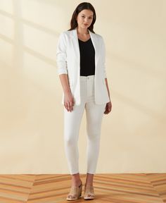 Complete your office outfits with this sharp blazer from Rafaella. The women’s blazer has a sleek modern fit, and it’s made with Ponte knit fabric that offers both a smooth, structured look and a hint of comfortable stretch. The single breasted women’s jacket is completed by a single button closure, two front pockets and classic notched lapels. 60% Viscose / 35% Polyester / 5% Elastane Ponte Fabrication Ponte Knit Fabrication Provides Structure And Stretch Modern Fit Notched Lapels For A Polishe Blazer Top, Single Breasted Blazer, High Hips, Breasted Blazer, Black Solid, Office Outfits, Black Blazers, Modern Fit, Body Measurements